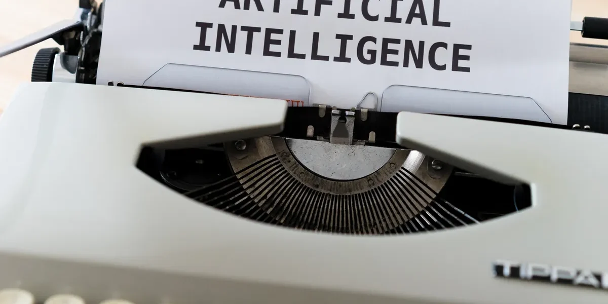 typewriter page labeled artificial intelligence