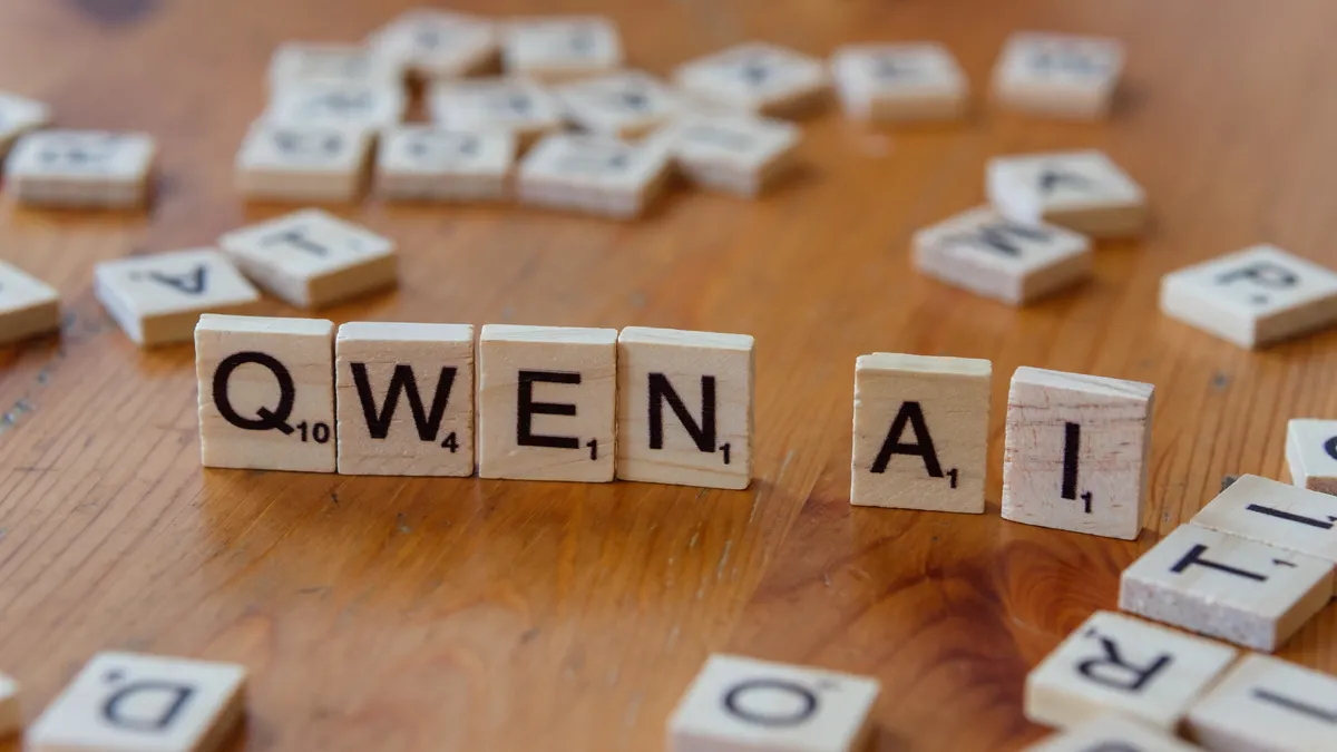 Jasper vs Anyword: which AI writer fits ad copy better? Jasper vs Anyword: which AI writer fits ad copy better? — Wooden Letter Tiles Spelling 'Qwen AI' on Table