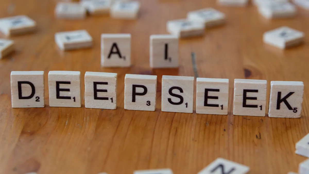 Jasper vs Rytr: feature-by-feature comparison Jasper vs Rytr: feature-by-feature comparison — Scrabble Tiles Spelling Deepseek AI Concept